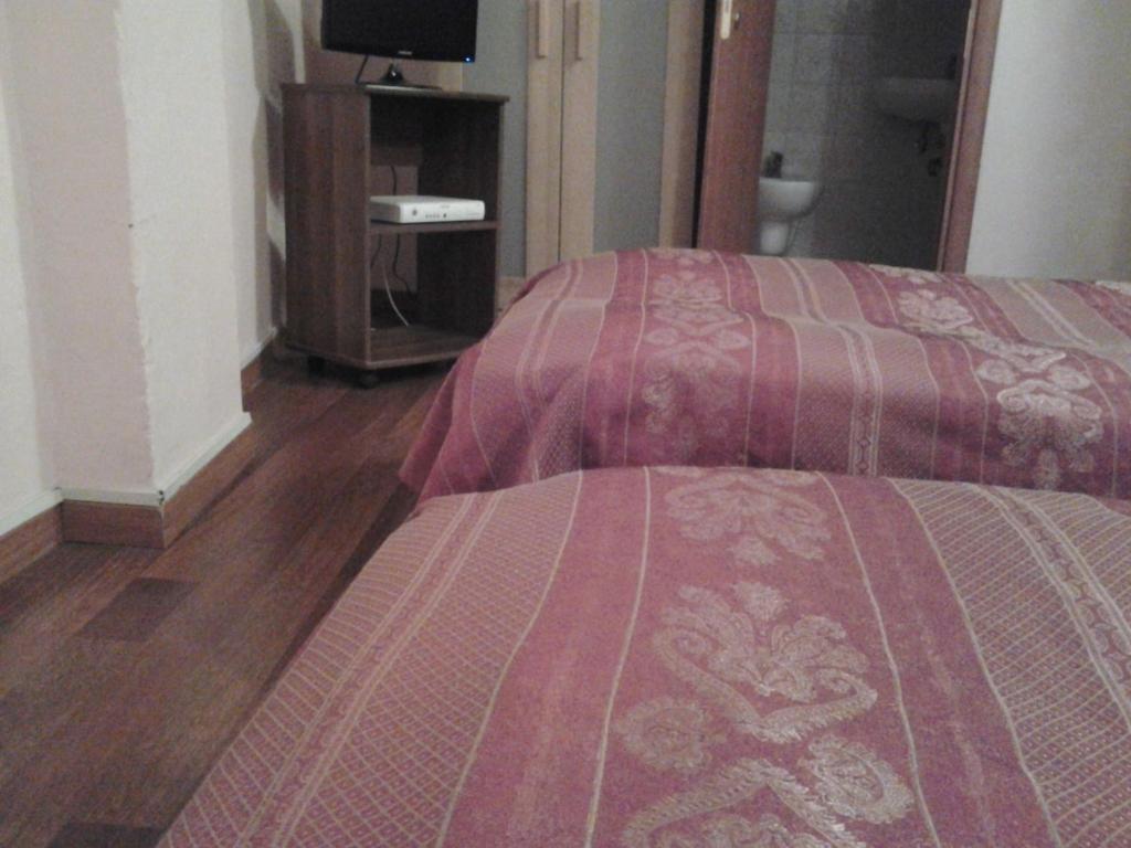 Hotel Perla Bologna Værelse billede